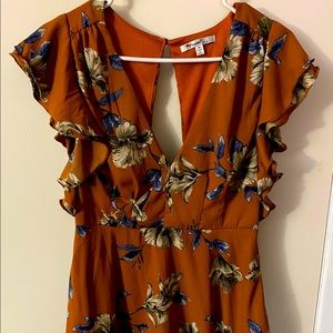 Orange floral blouse with open back